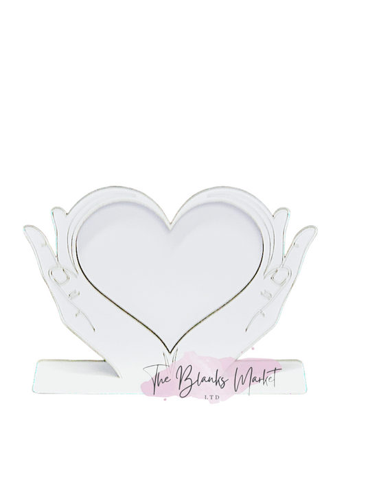 Freestanding heart in hand